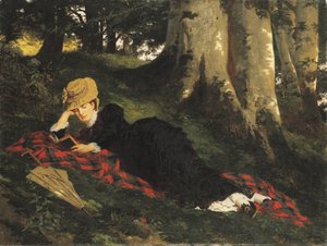 Mujer leyendo en un bosque